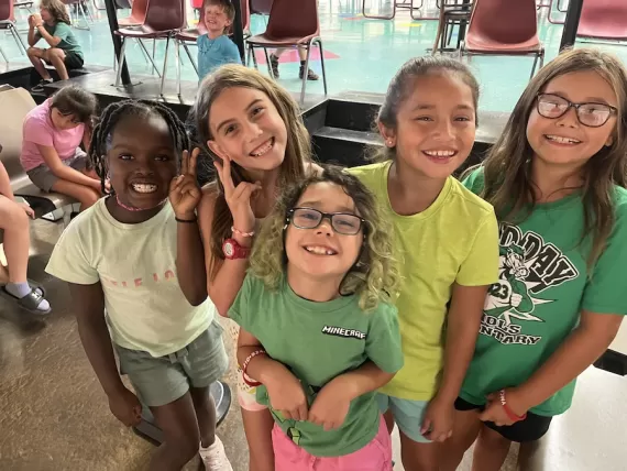 A group of summer day campers enjoying a field trip at the YMCA at O.P. Schnabel Park